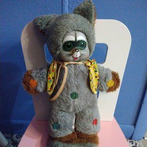 Vintage musical toy racoon